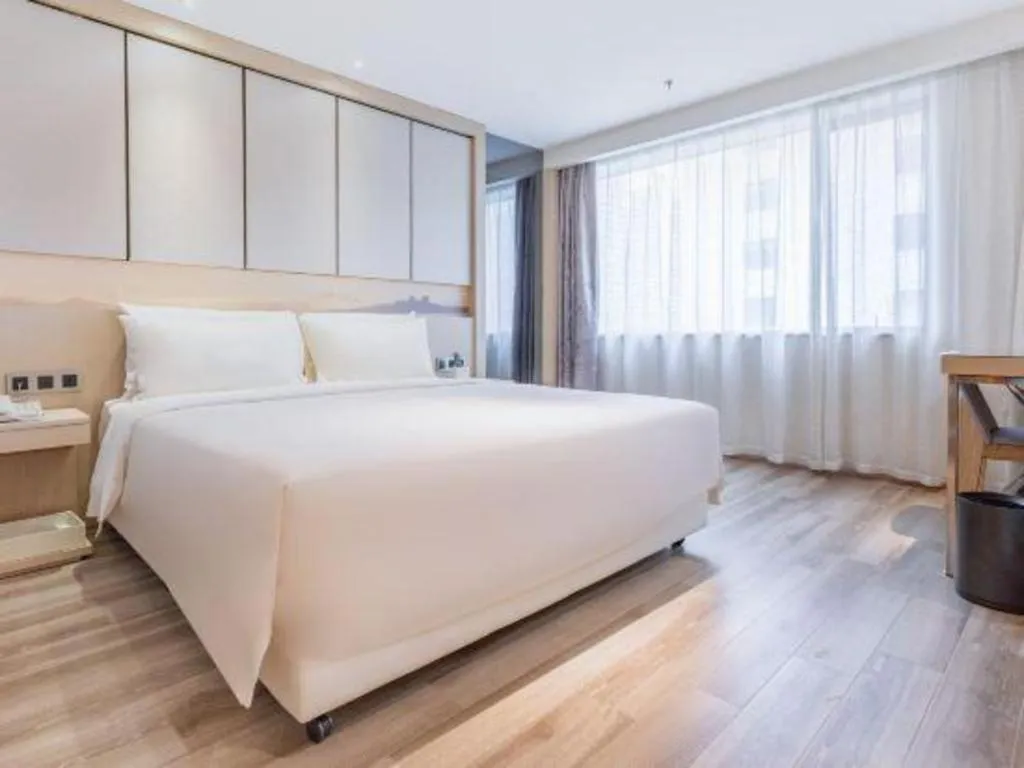 Bed in Atour Hotel Xiamen City Government Dongdu Passenger Transport Terminal