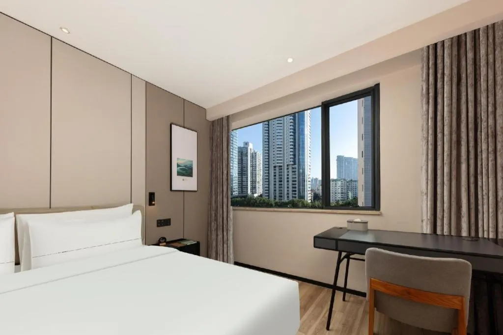 Bed in Atour Hotel Xiamen City Government Dongdu Passenger Transport Terminal