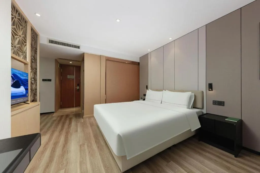 Bed in Atour Hotel Xiamen City Government Dongdu Passenger Transport Terminal