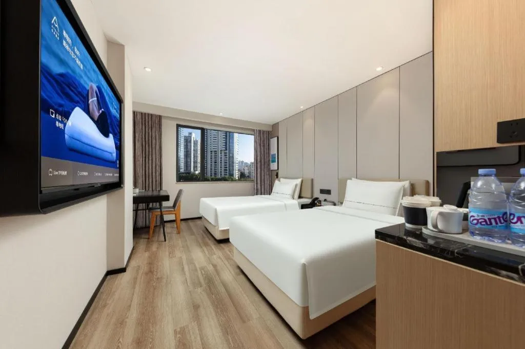 Bed in Atour Hotel Xiamen City Government Dongdu Passenger Transport Terminal