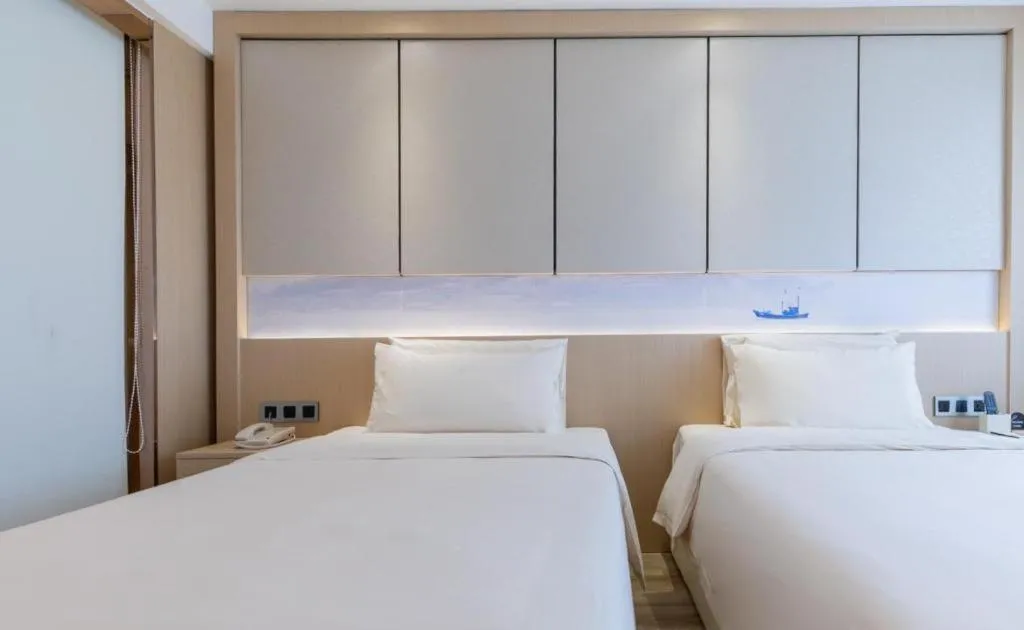 Bed in Atour Hotel Xiamen City Government Dongdu Passenger Transport Terminal