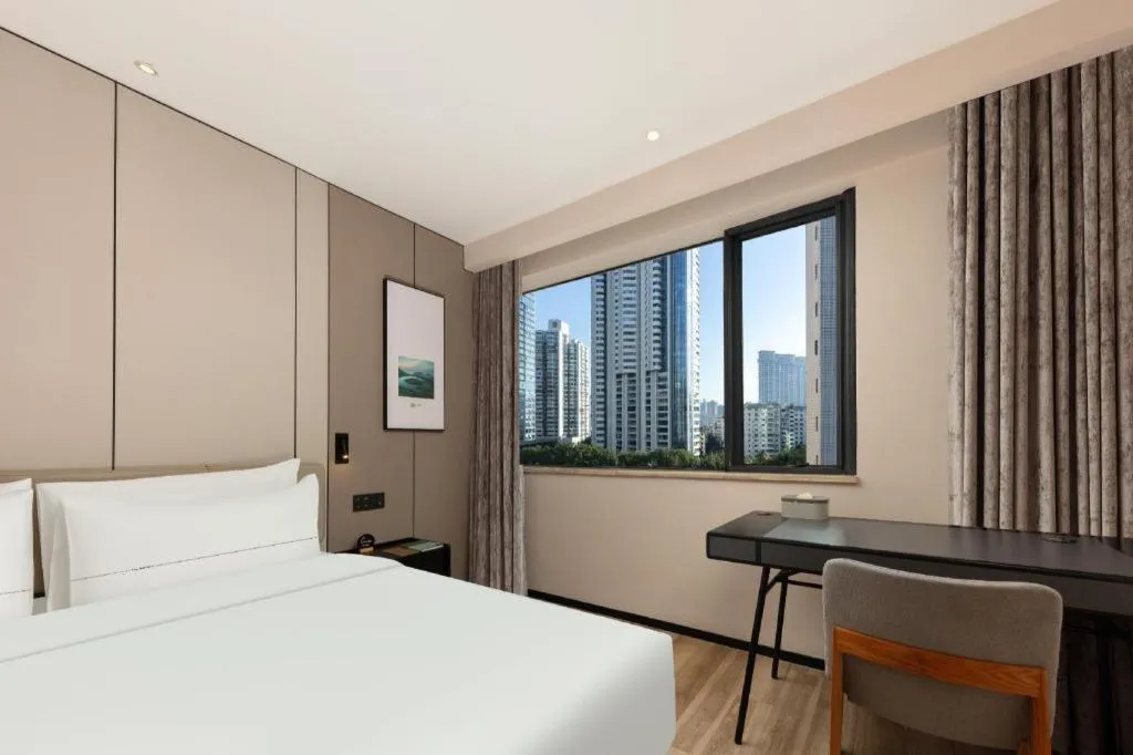 Bed in Atour Hotel Xiamen City Government Dongdu Passenger Transport Terminal