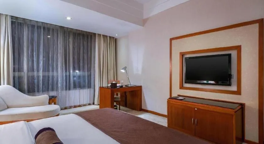 Bed in Yihao International Hotel