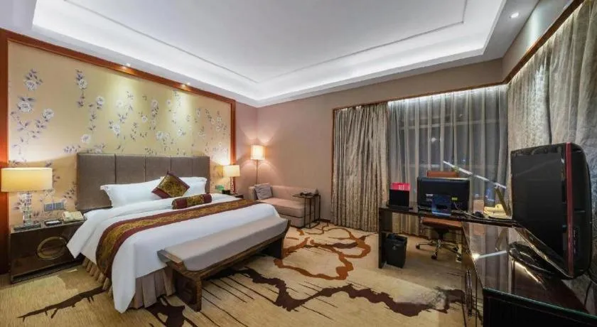 Bed in Yihao International Hotel