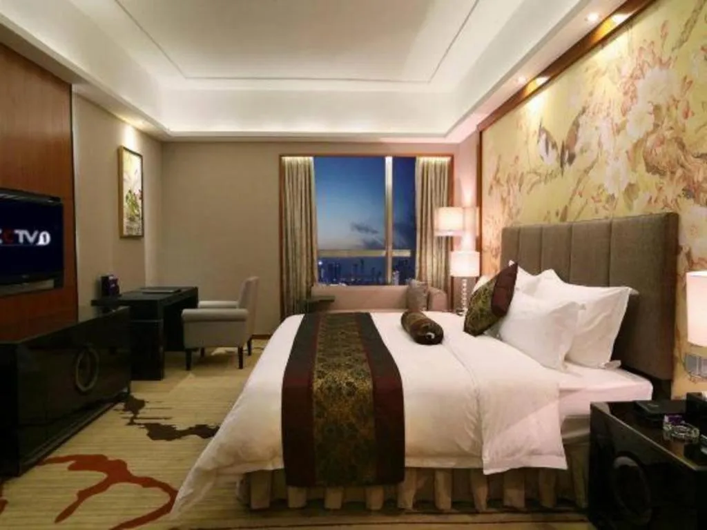 Bed in Yihao International Hotel