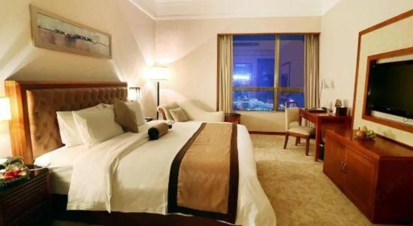 Bed in Yihao International Hotel