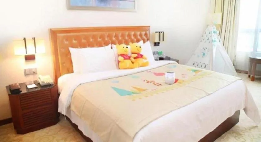 Bed in Yihao International Hotel