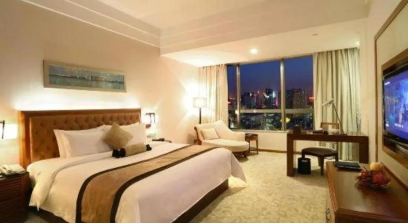Bed in Yihao International Hotel
