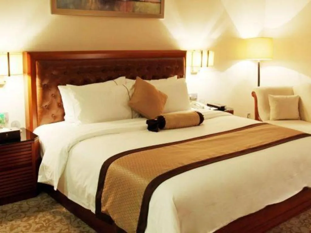 Bed in Yihao International Hotel