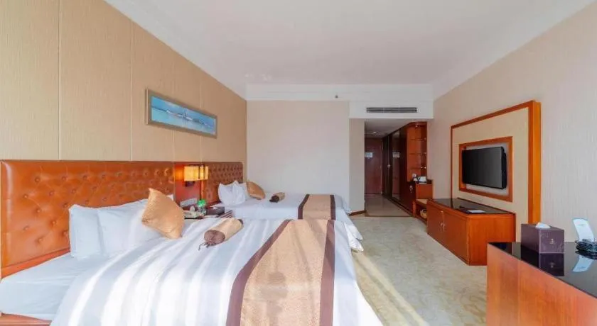 Bed in Yihao International Hotel