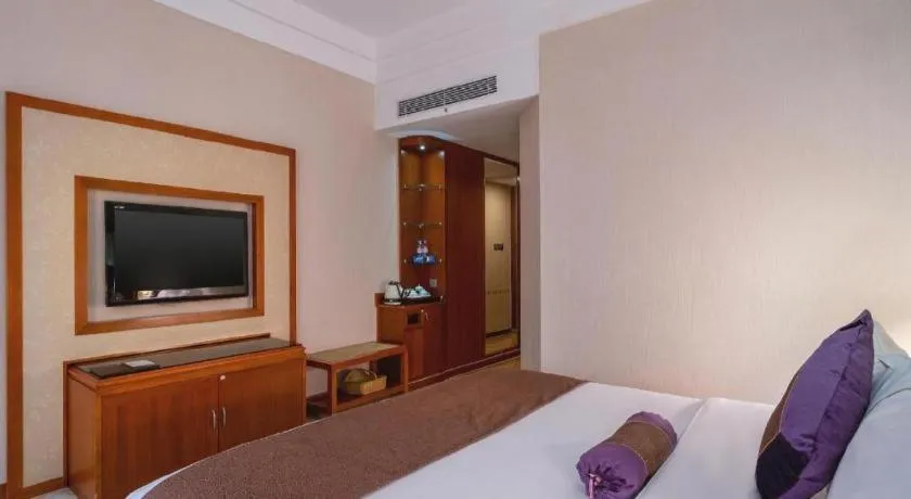 Bed in Yihao International Hotel