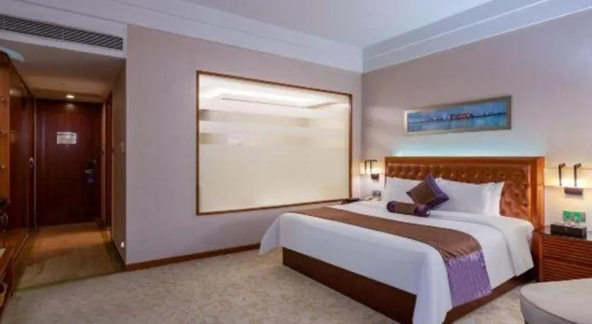 Bed in Yihao International Hotel