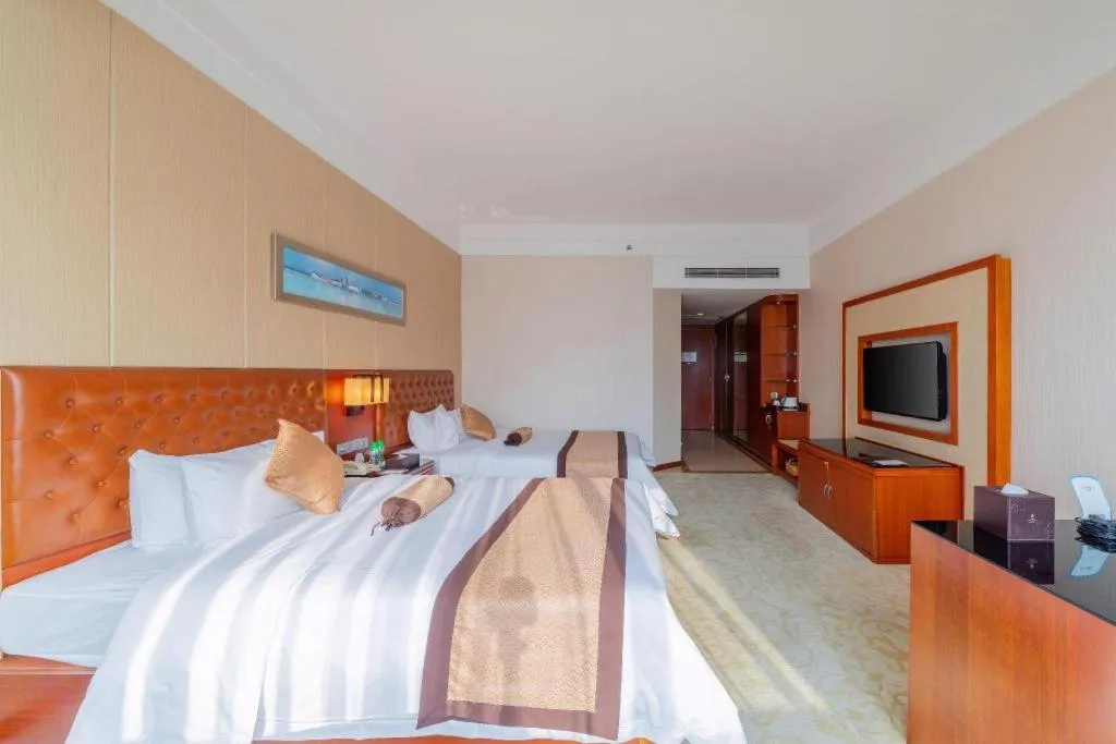 Bed in Yihao International Hotel