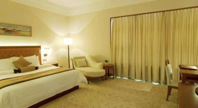 Bed in Yihao International Hotel