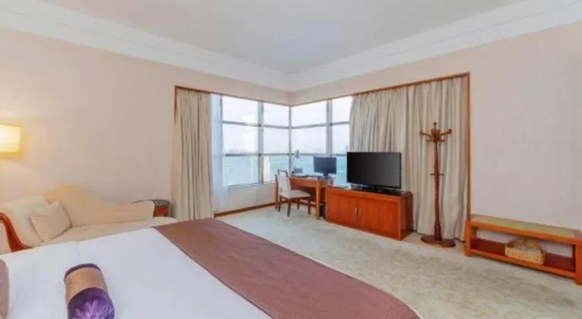 Bed in Yihao International Hotel