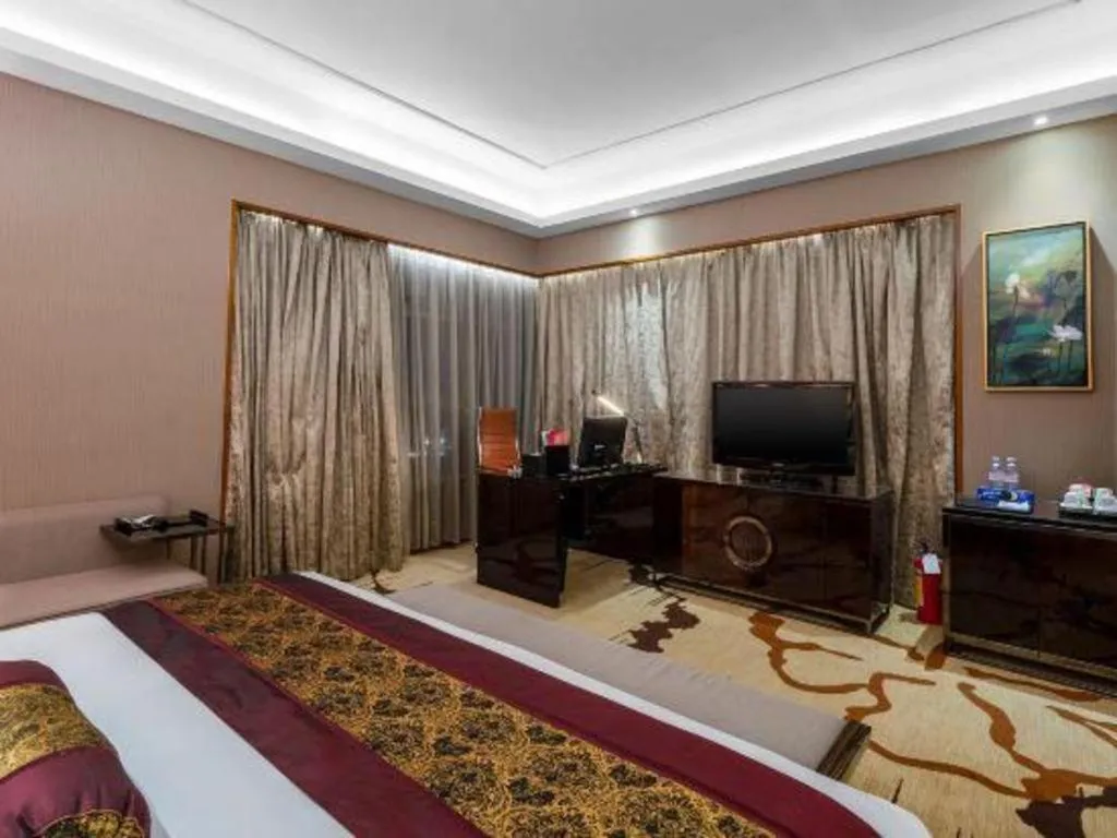 Bed in Yihao International Hotel