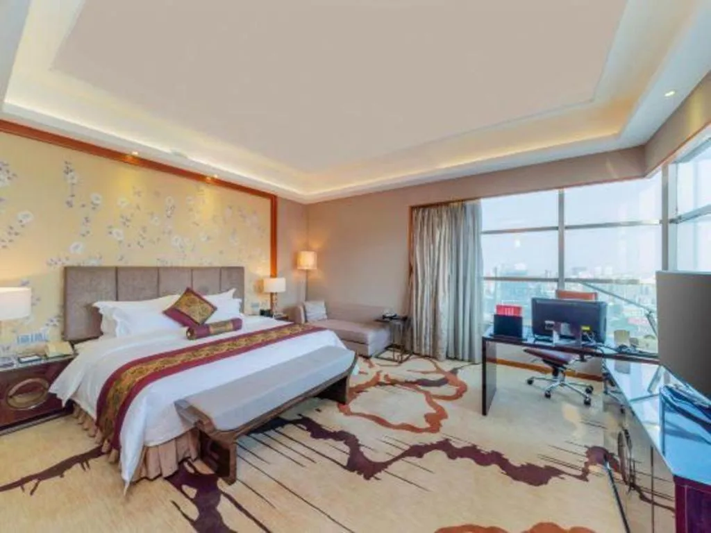 Bed in Yihao International Hotel