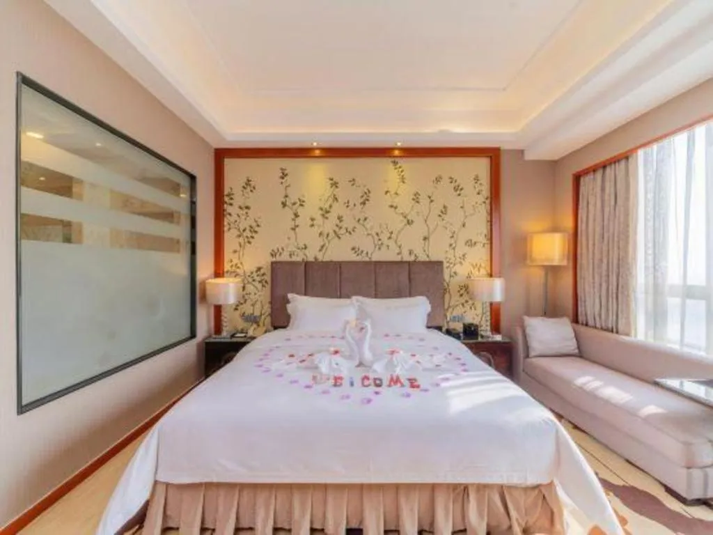 Bed in Yihao International Hotel