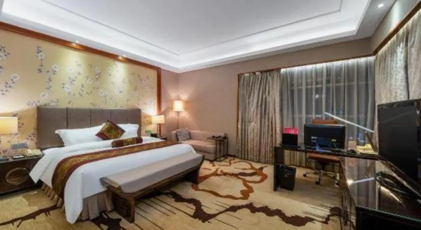 Bed in Yihao International Hotel