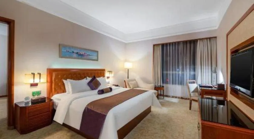 Bed in Yihao International Hotel