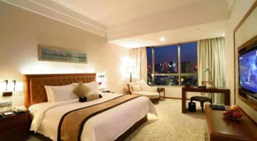 Bed in Yihao International Hotel