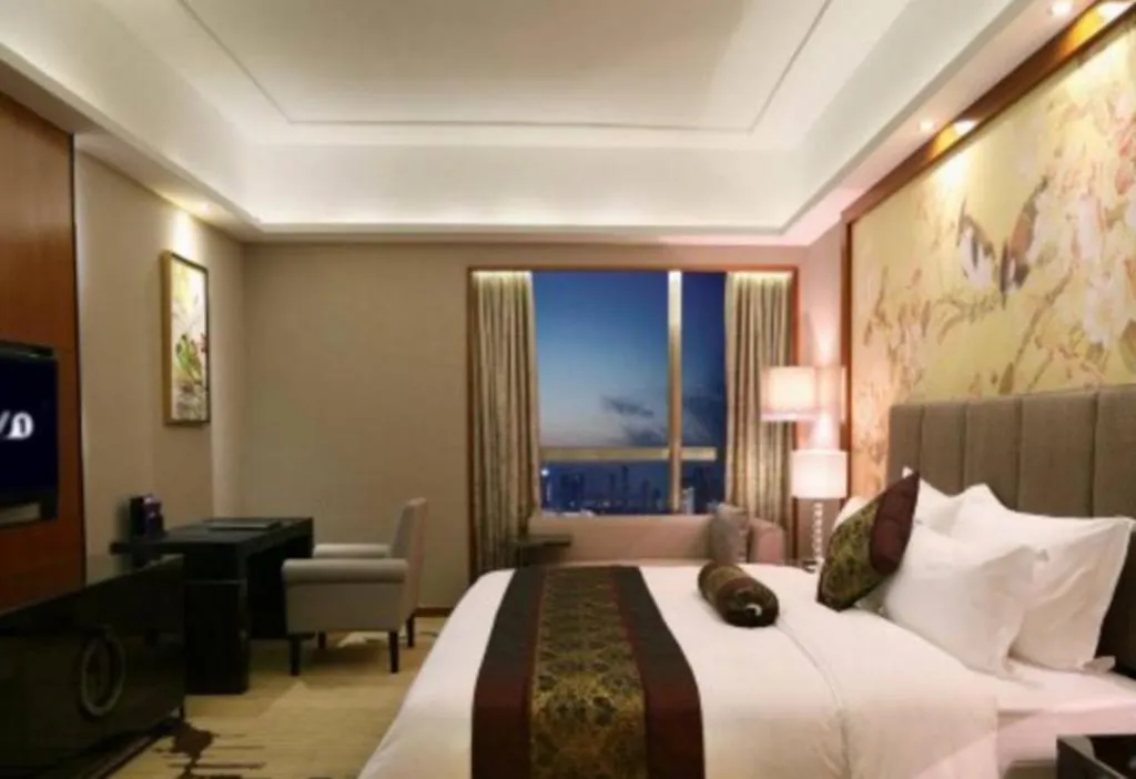 Bed in Yihao International Hotel