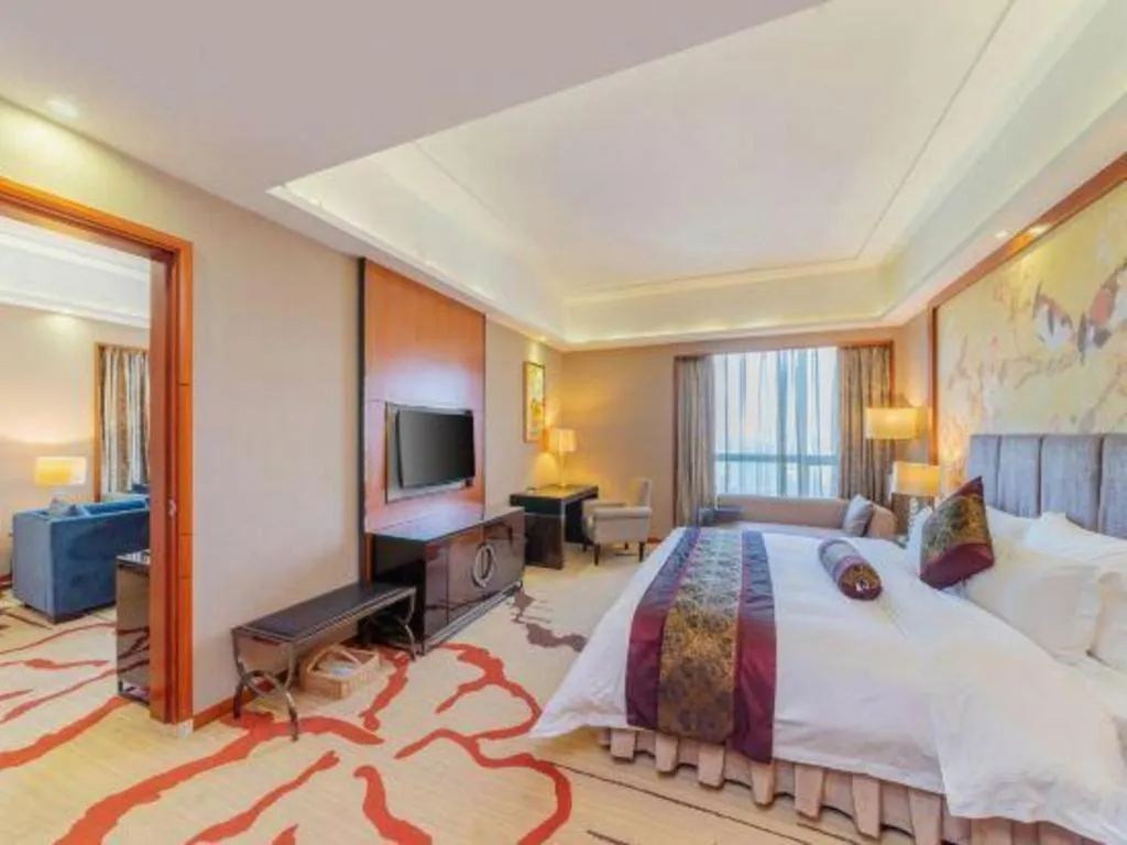 Bed in Yihao International Hotel