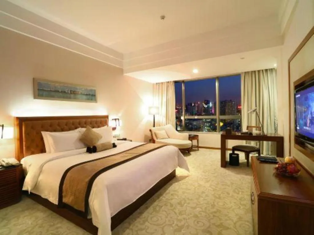 Bed in Yihao International Hotel