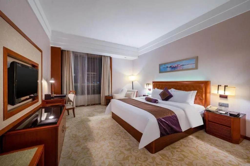 Bed in Yihao International Hotel