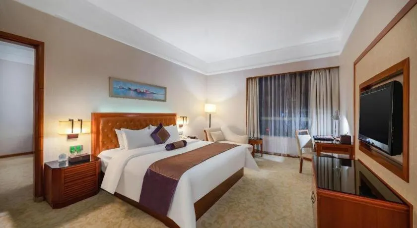 Bed in Yihao International Hotel