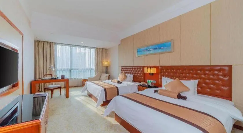 Bed in Yihao International Hotel