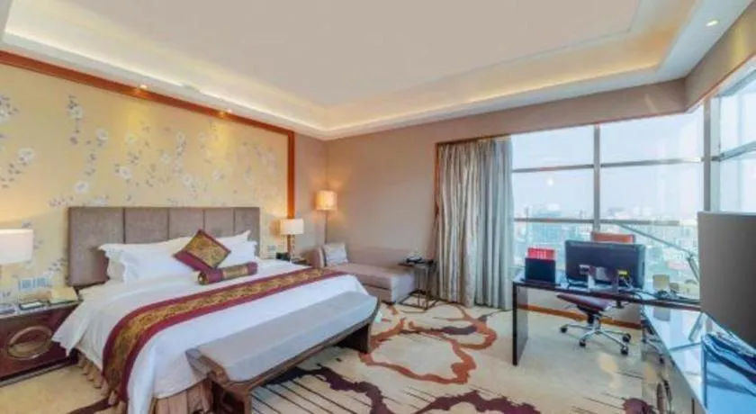 Bed in Yihao International Hotel