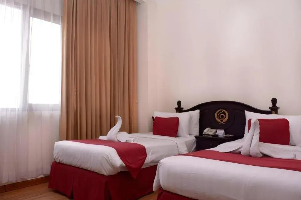 Bed in Quds Royal Hotel Bed in Quds Royal Hotel