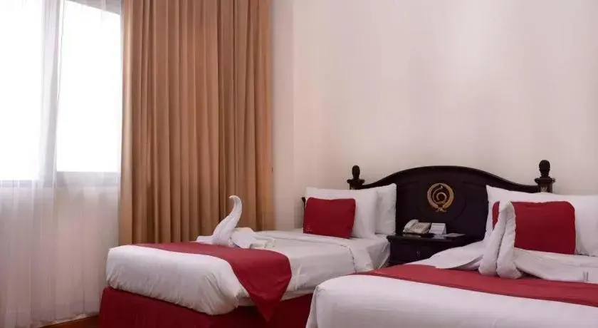 Bed in Quds Royal Hotel Bed in Quds Royal Hotel