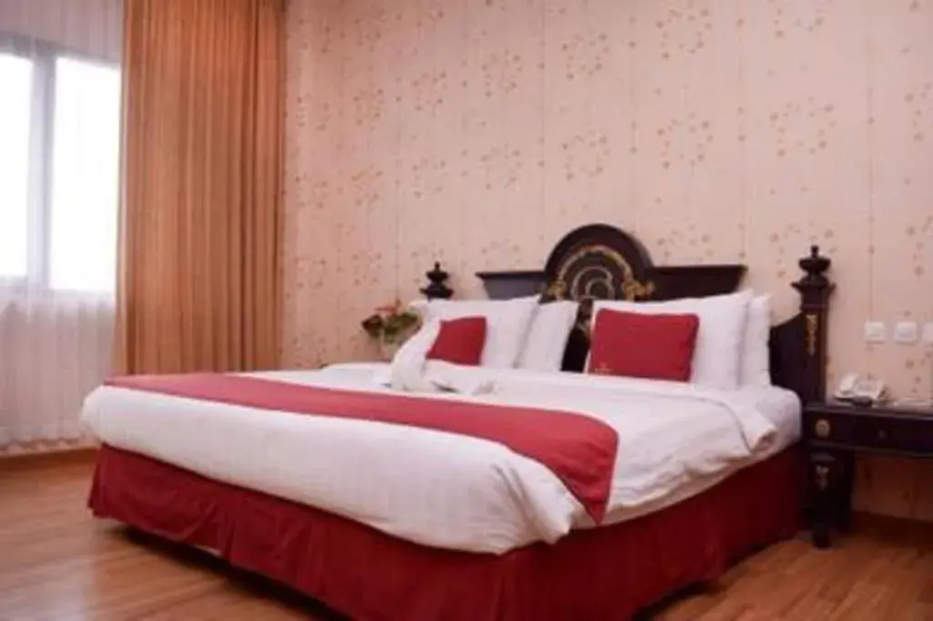 Bed in Quds Royal Hotel Bed in Quds Royal Hotel