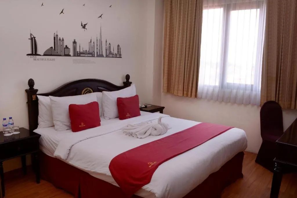 Bed in Quds Royal Hotel