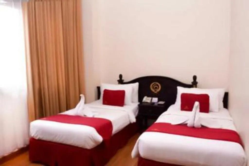 Bed in Quds Royal Hotel