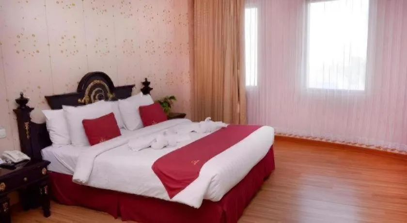 Bed in Quds Royal Hotel