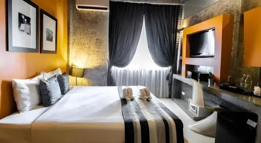 Bed in The B Ranong Trend Hotel Bed in The B Ranong Trend Hotel