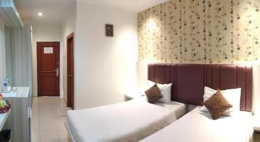 Bed in Jelita Tanjung Hotel