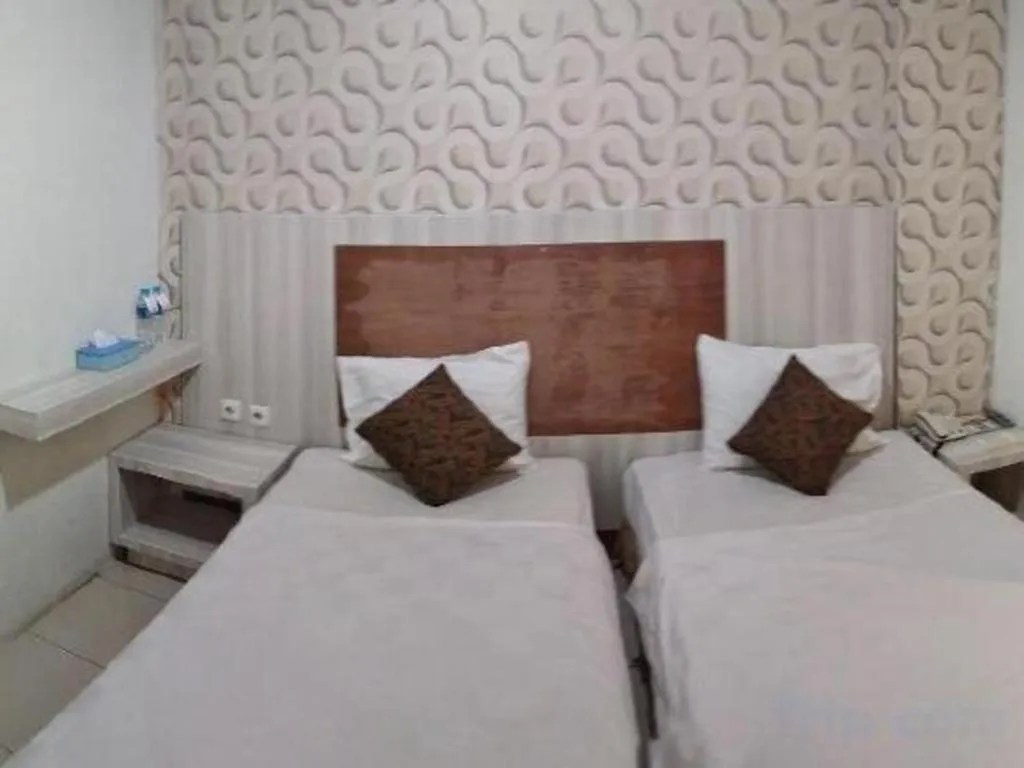 Bed in Jelita Tanjung Hotel
