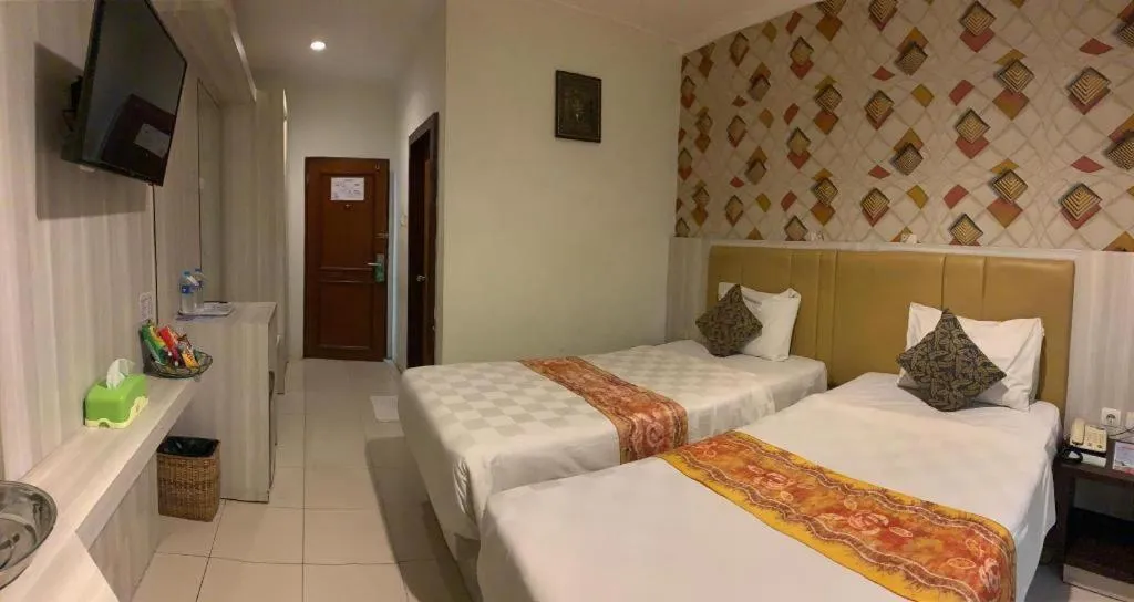 Bed in Jelita Tanjung Hotel