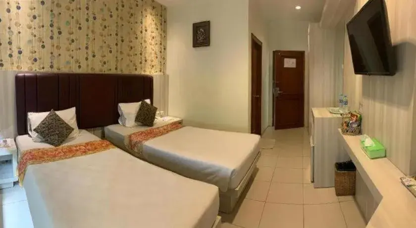 Bed in Jelita Tanjung Hotel Bed in Jelita Tanjung Hotel