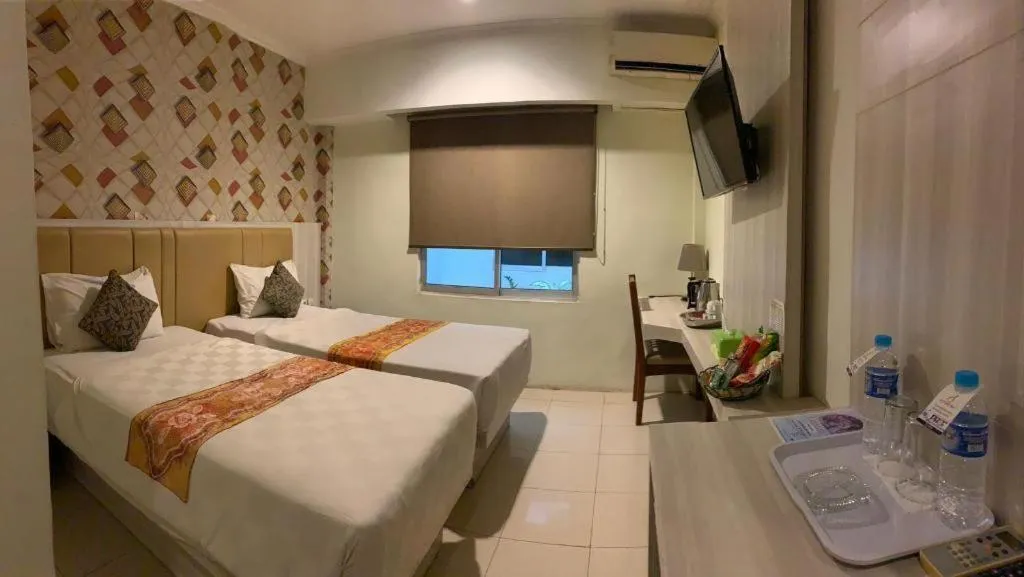 Bed in Jelita Tanjung Hotel