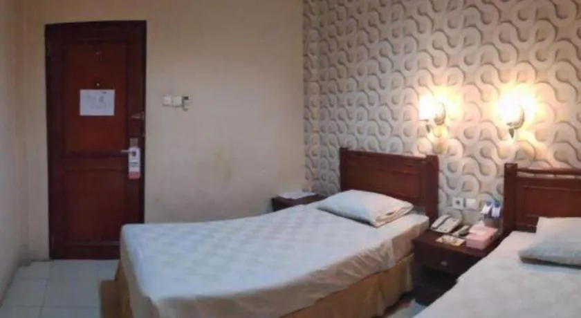 Bed in Jelita Tanjung Hotel