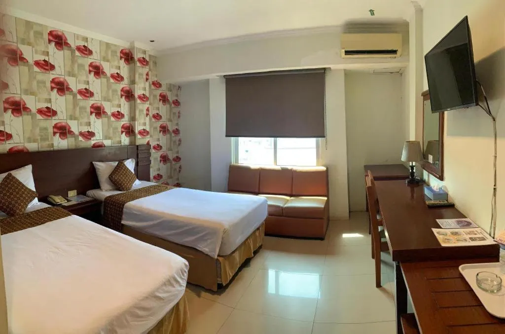 Bed in Jelita Tanjung Hotel