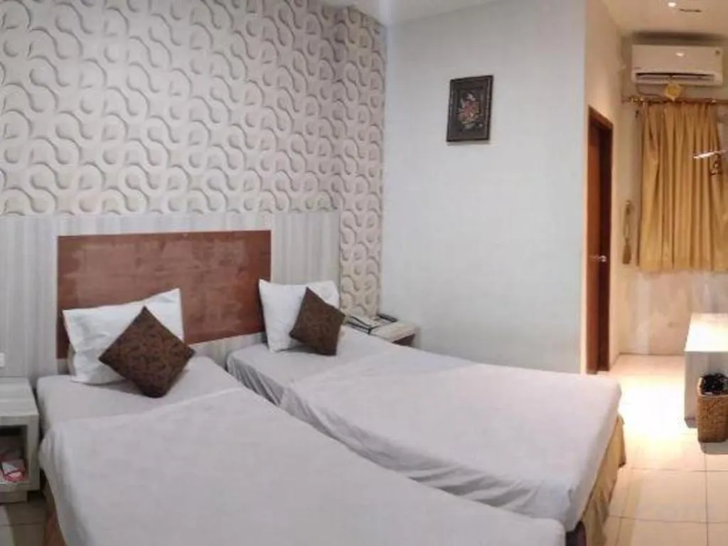 Bed in Jelita Tanjung Hotel