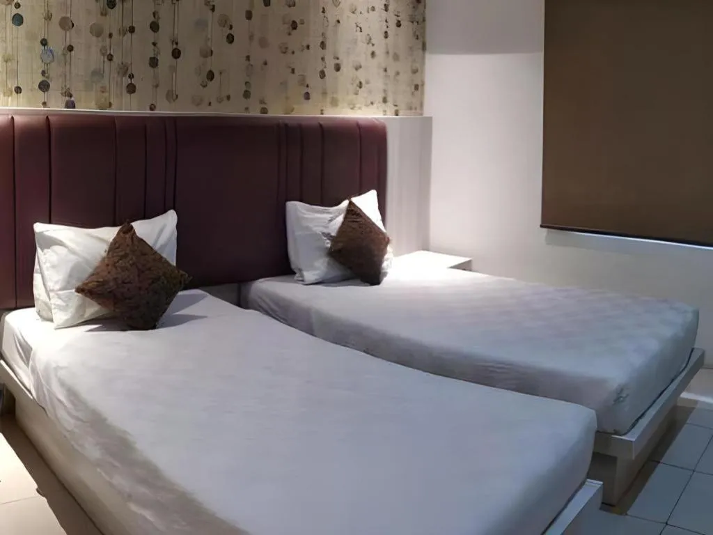 Bed in Jelita Tanjung Hotel