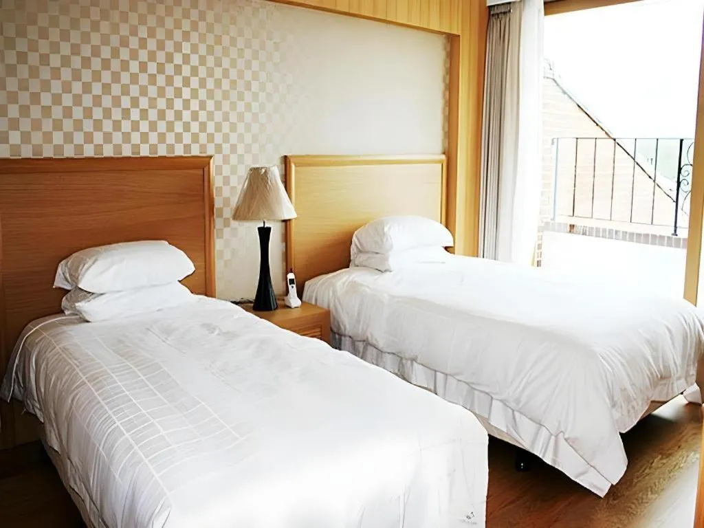 Bed in Suanbo Park Hotel