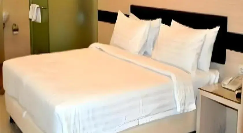 Bed in Sumi Hotel Mangga Besar Bed in Sumi Hotel Mangga Besar